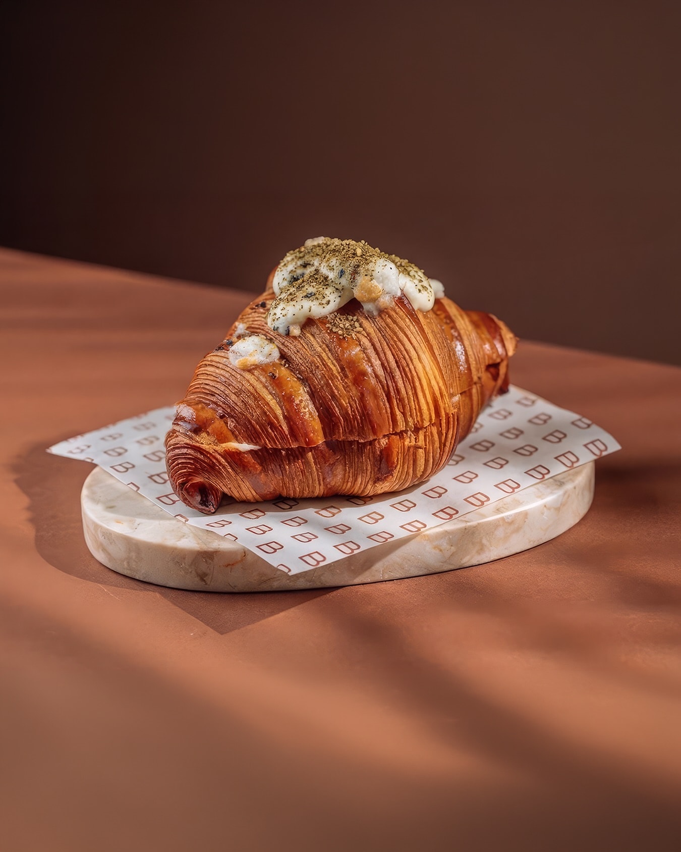 A croissant on a pedestal at BRĒD