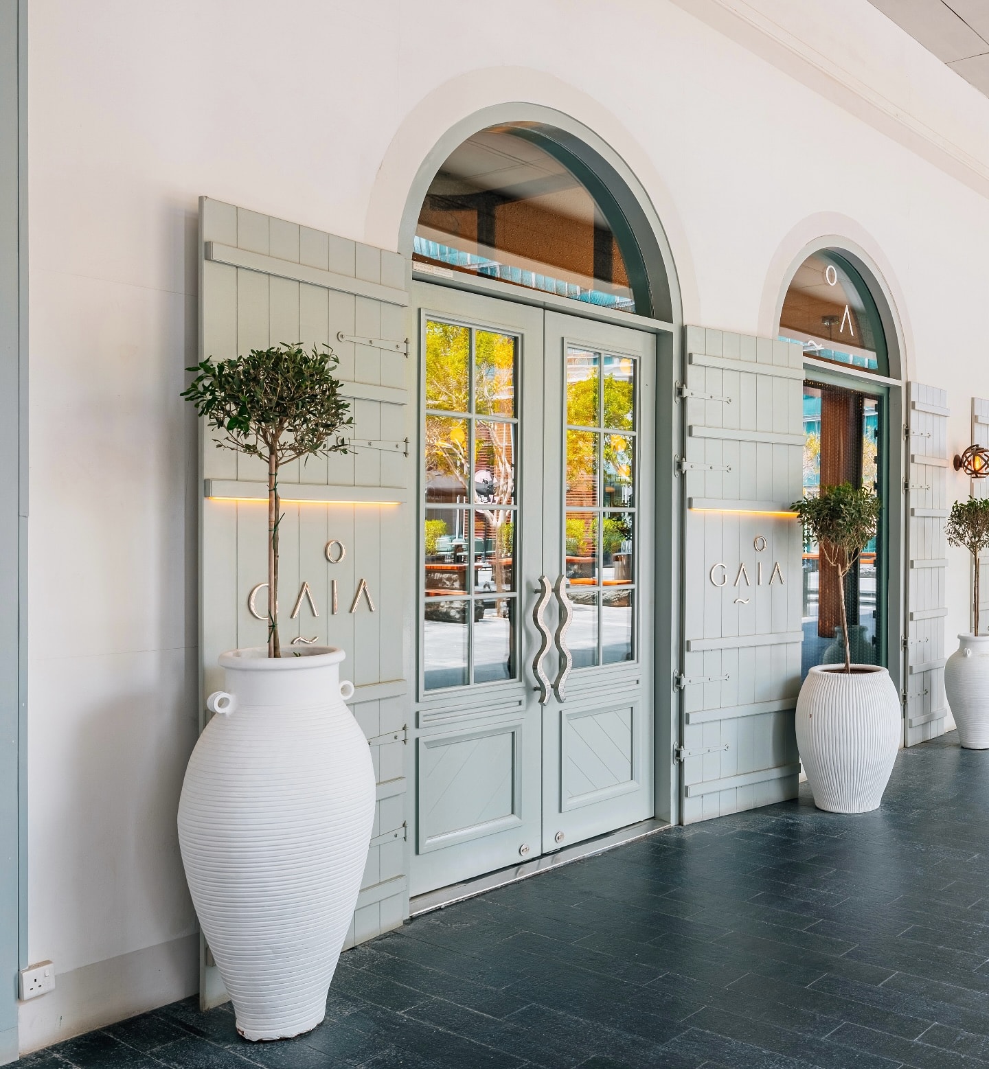 Gaia's mint-green entrance in DIFC