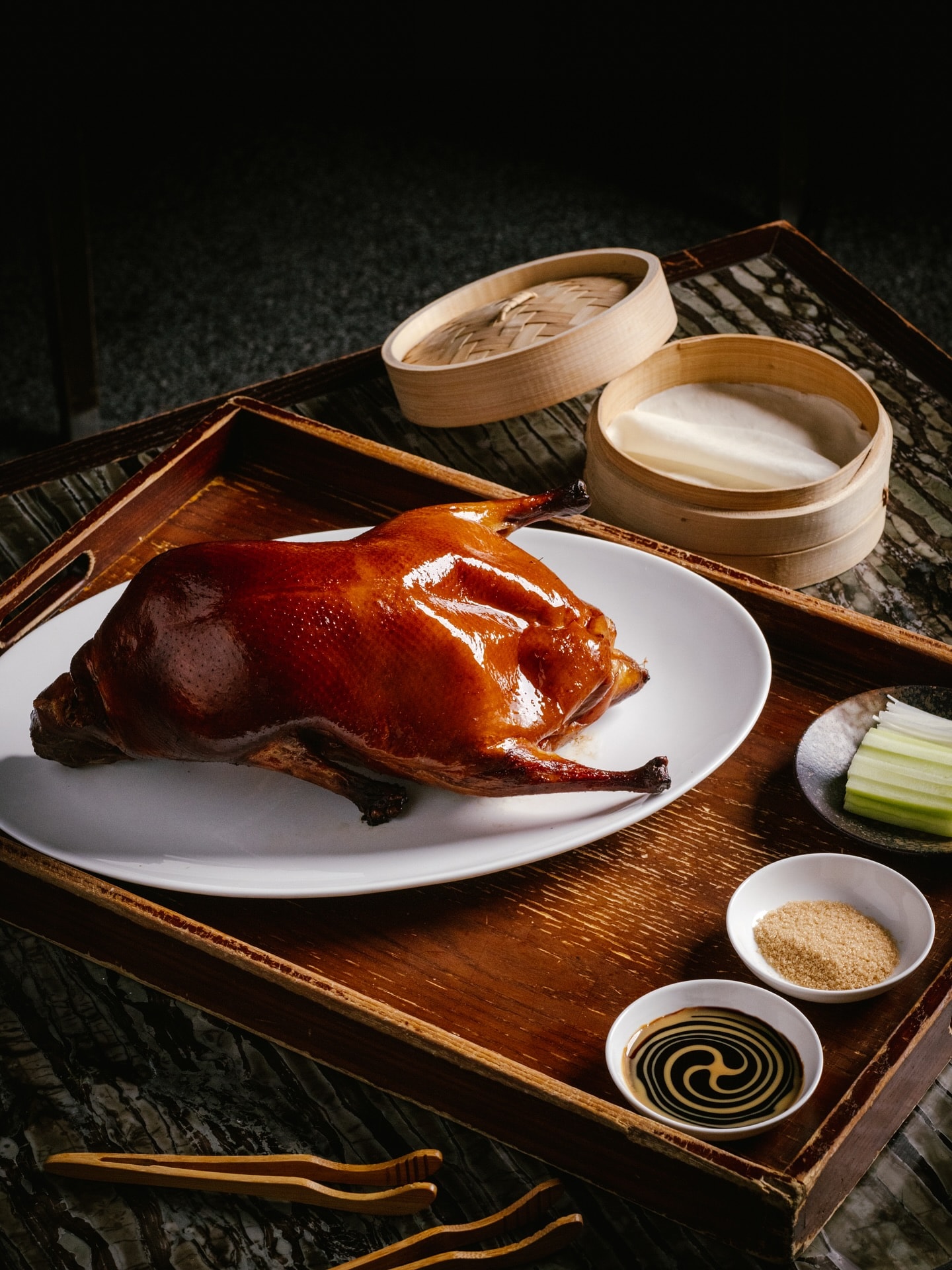 Peking duck carved at Mott 32