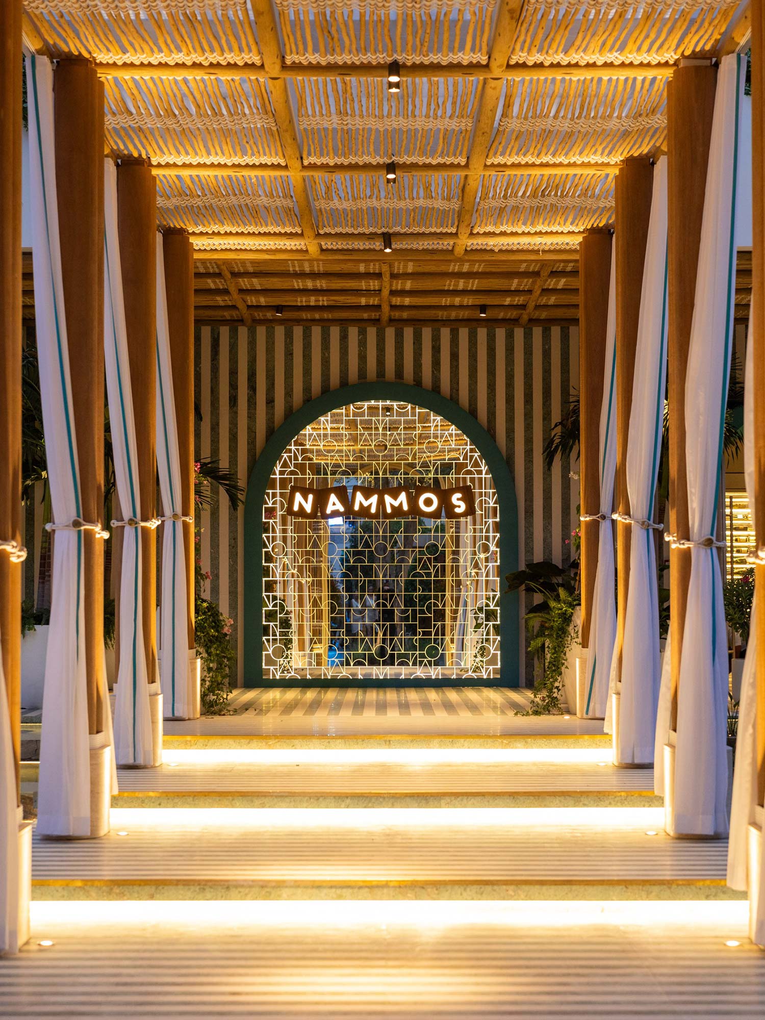 The golden arcade at Nammos