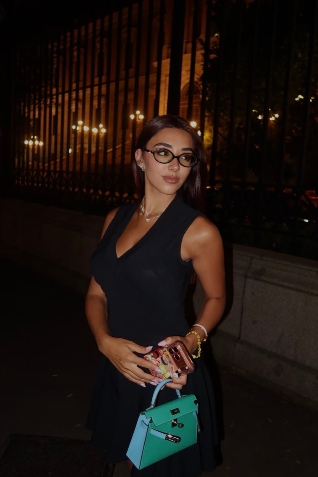 Aurora out at night in a black dress