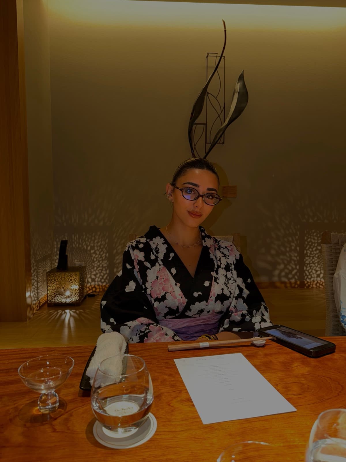 Aurora at a dinner table
