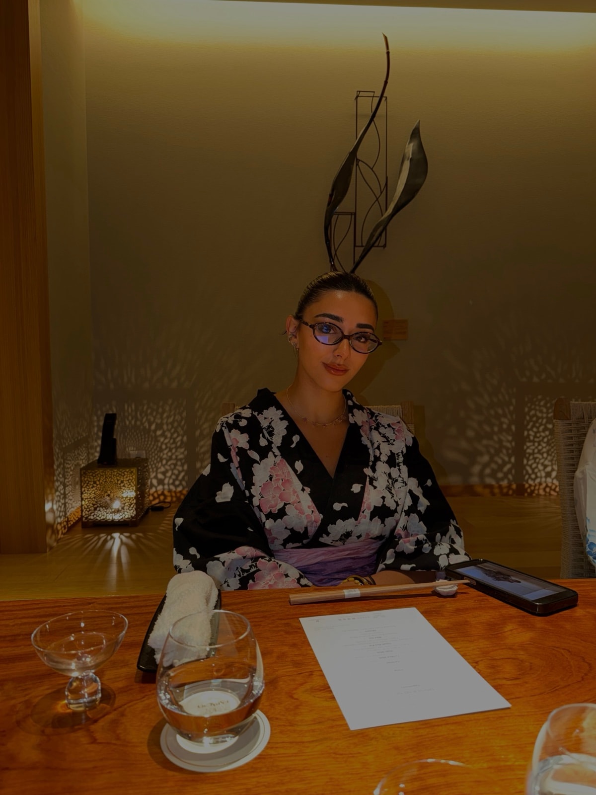 Aurora at a dinner table