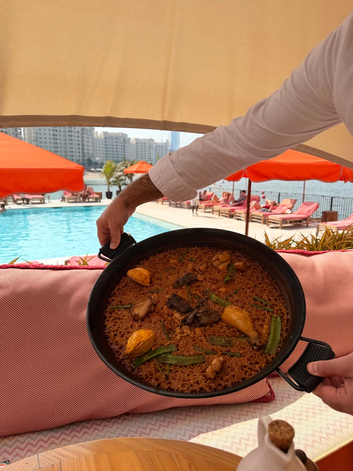 Aurora's paella arriving at the table