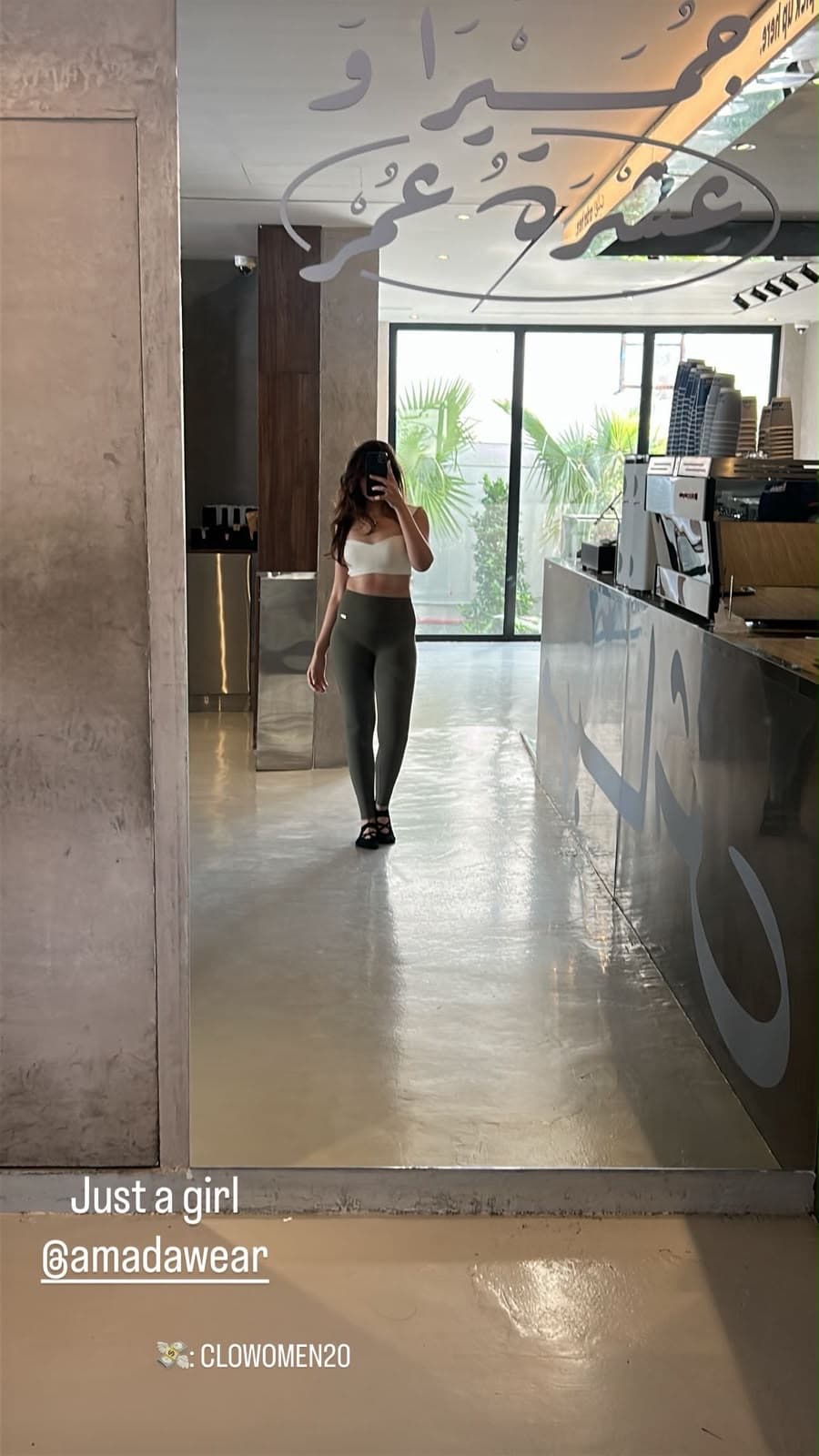 Rhea ordering at a café counter