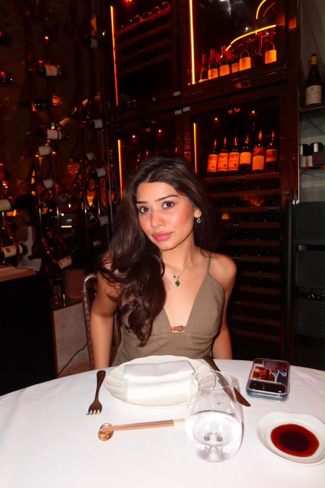 Rhea at a café table