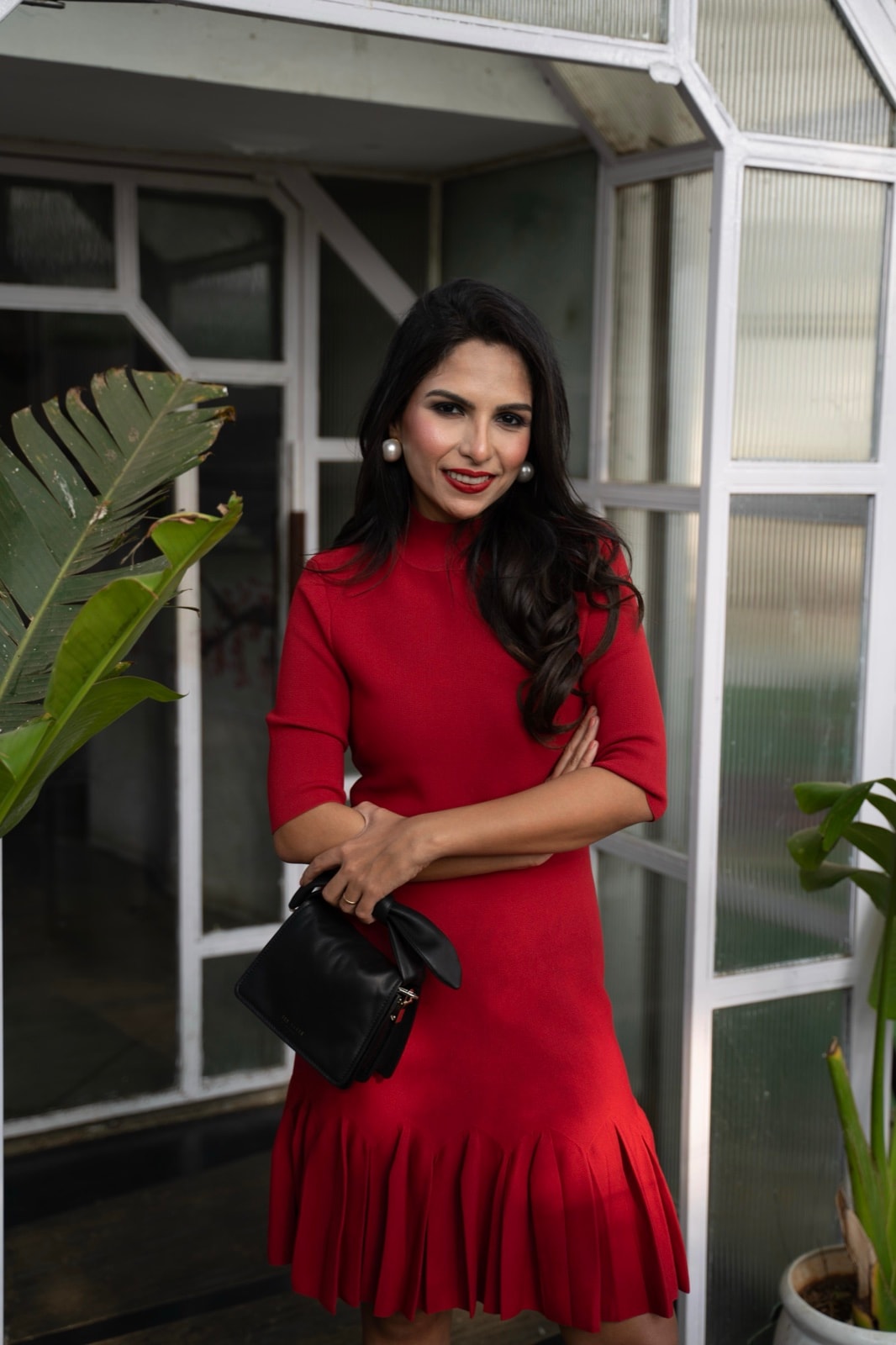 Karishma in red with her camera