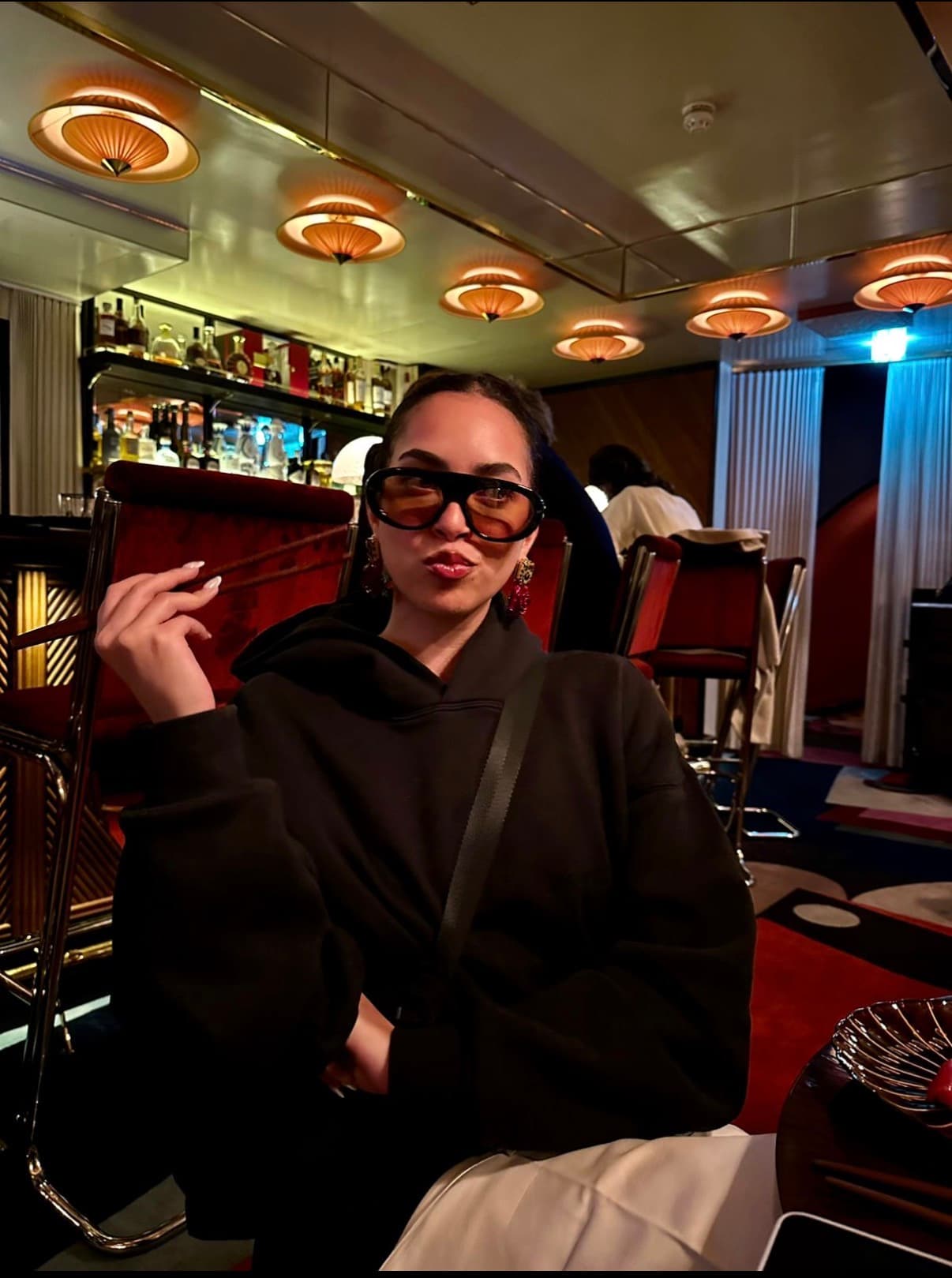 Nada at a dimly lit bar