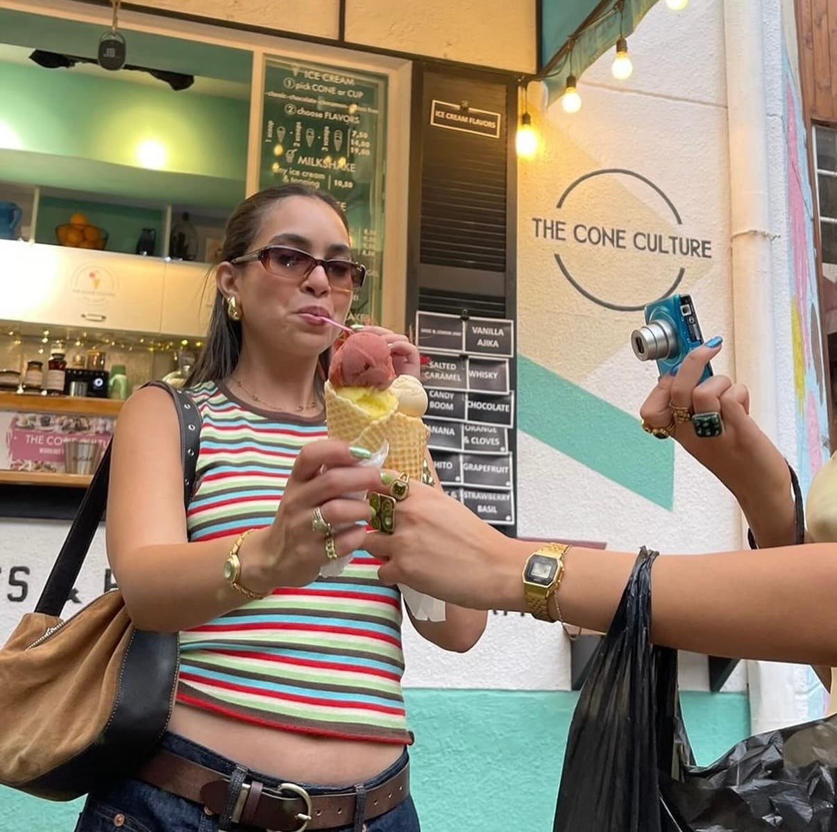 Nada tasting gelato outside The Cone Culture