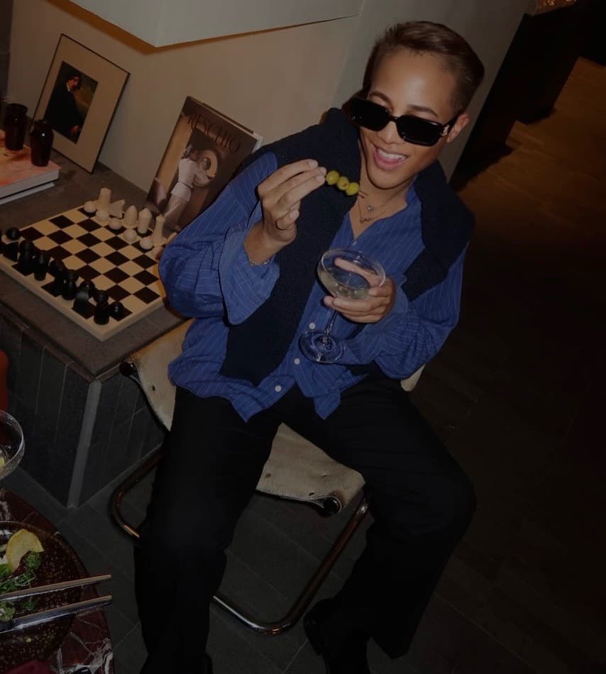 Ty with a martini and olives