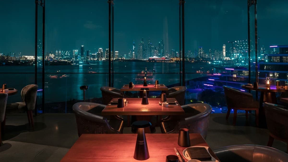 Skyline views from Akira Back’s window tables