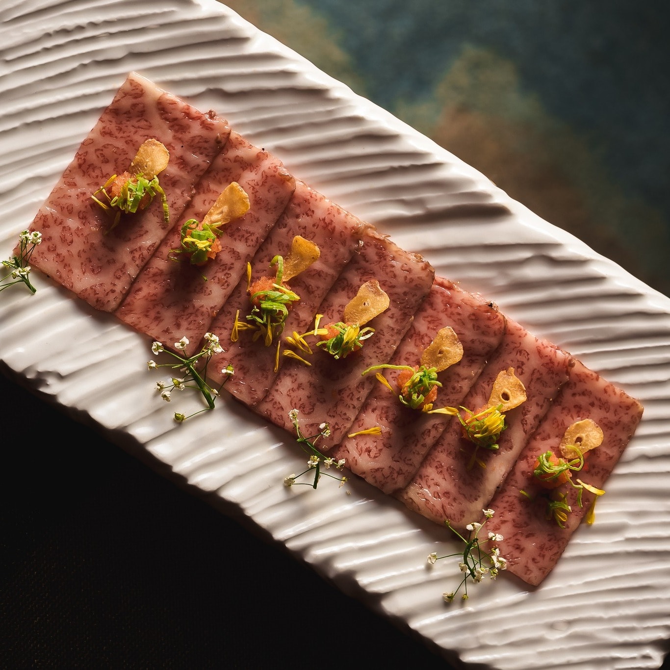 Glazed beef slices at Akira Back