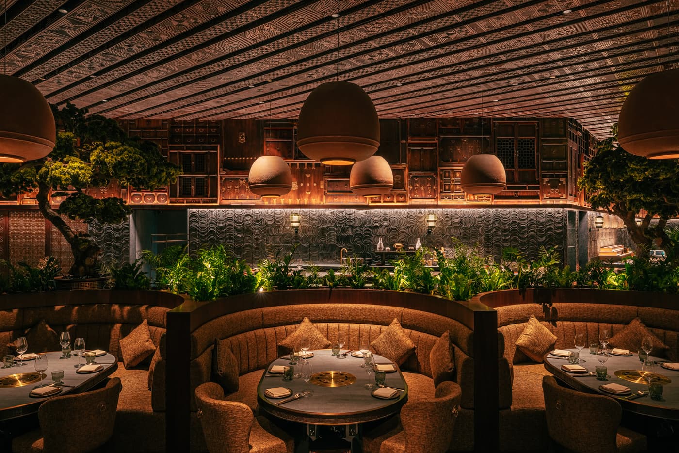 Lantern light over HANU’s banquettes