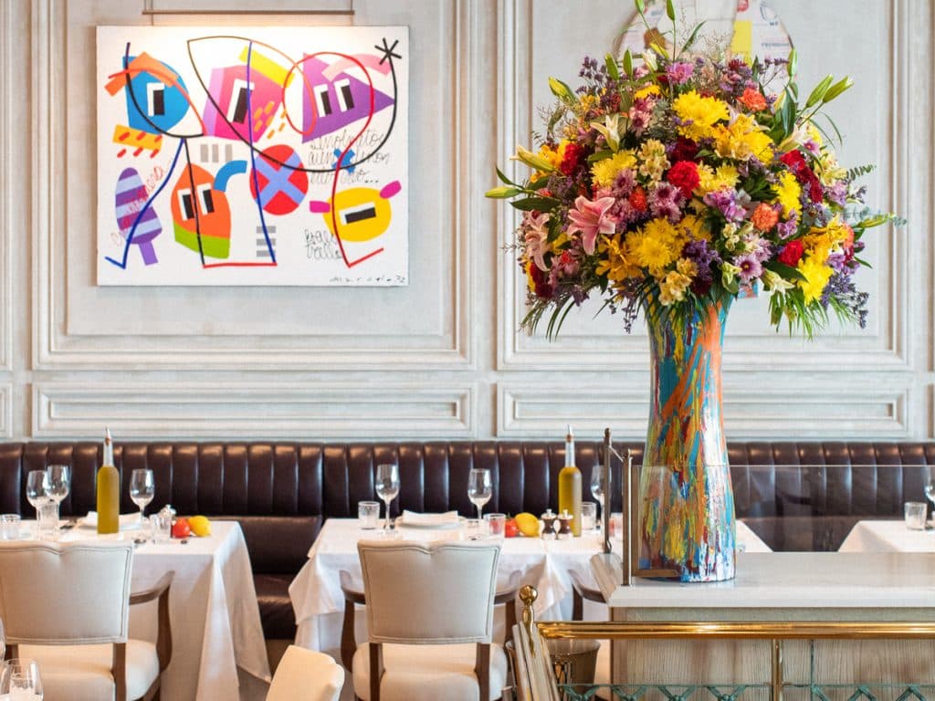 Fresh flowers and art on the walls at LPM