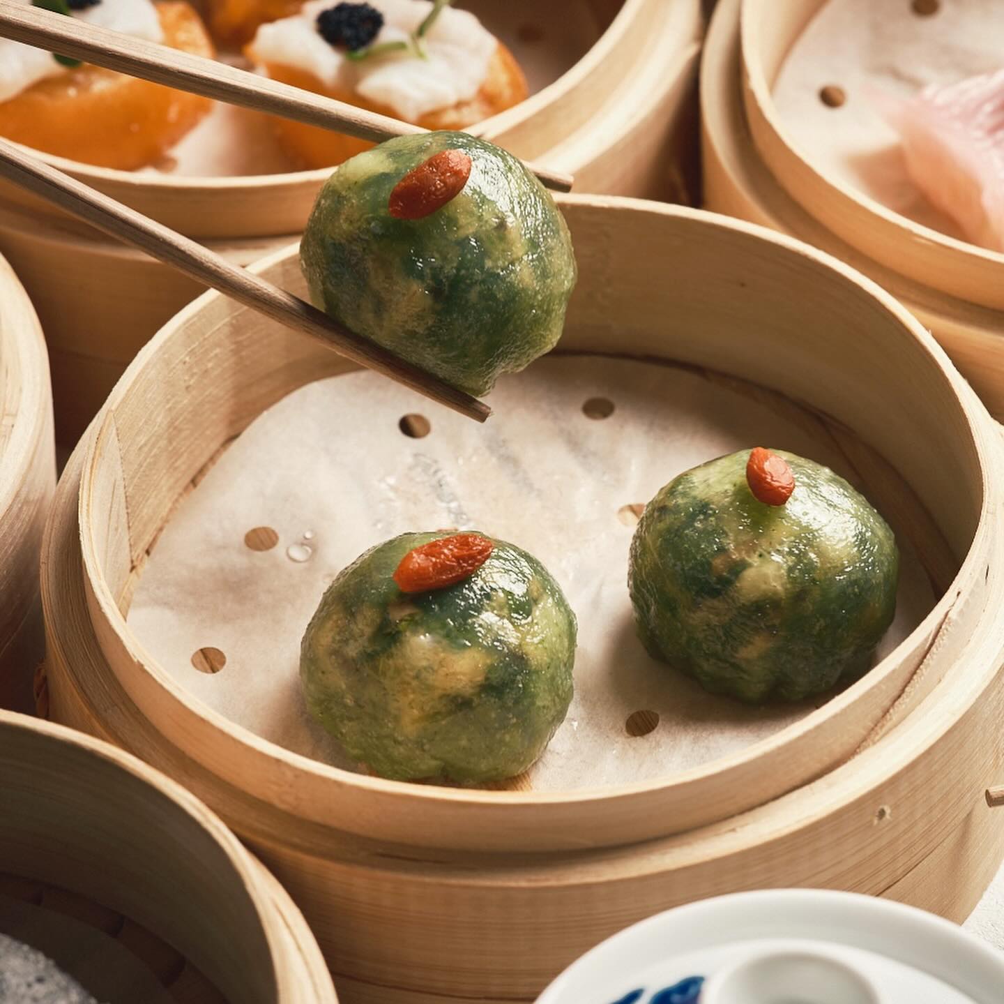 Jade dumplings in the steamer at Maiden Shanghai