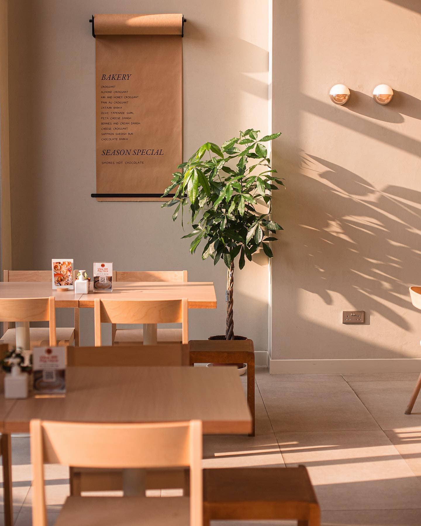 The warm minimal corner inside Milk Bakery