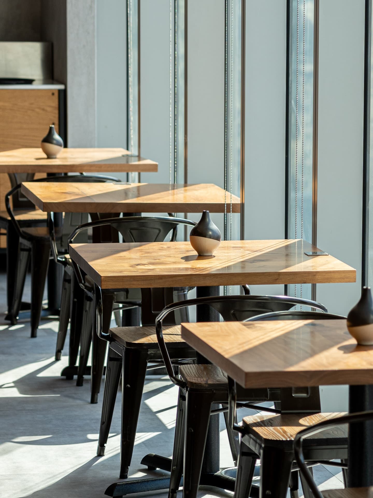 Window tables inside Pekoe Tea & Bread Bar